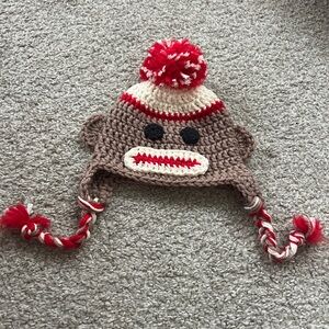 NWOT Brown Sock Monkey Hand Made Knit Hat for Babies and Infants with Red Accent